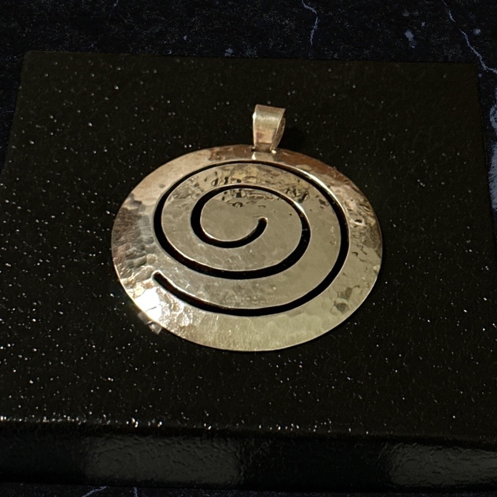 Costume jewelry pendant - silver